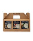 A three-pack of Reads Coffee Roasters in a brown cardboard carrier with a handle, shown on a plain white background.