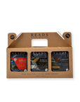 A 3-pack of Reads Coffee Roasters in a brown cardboard carrier box. The three individual coffee bags are visible through clear windows at the bottom of the box, featuring red, yellow, and dark black labels.