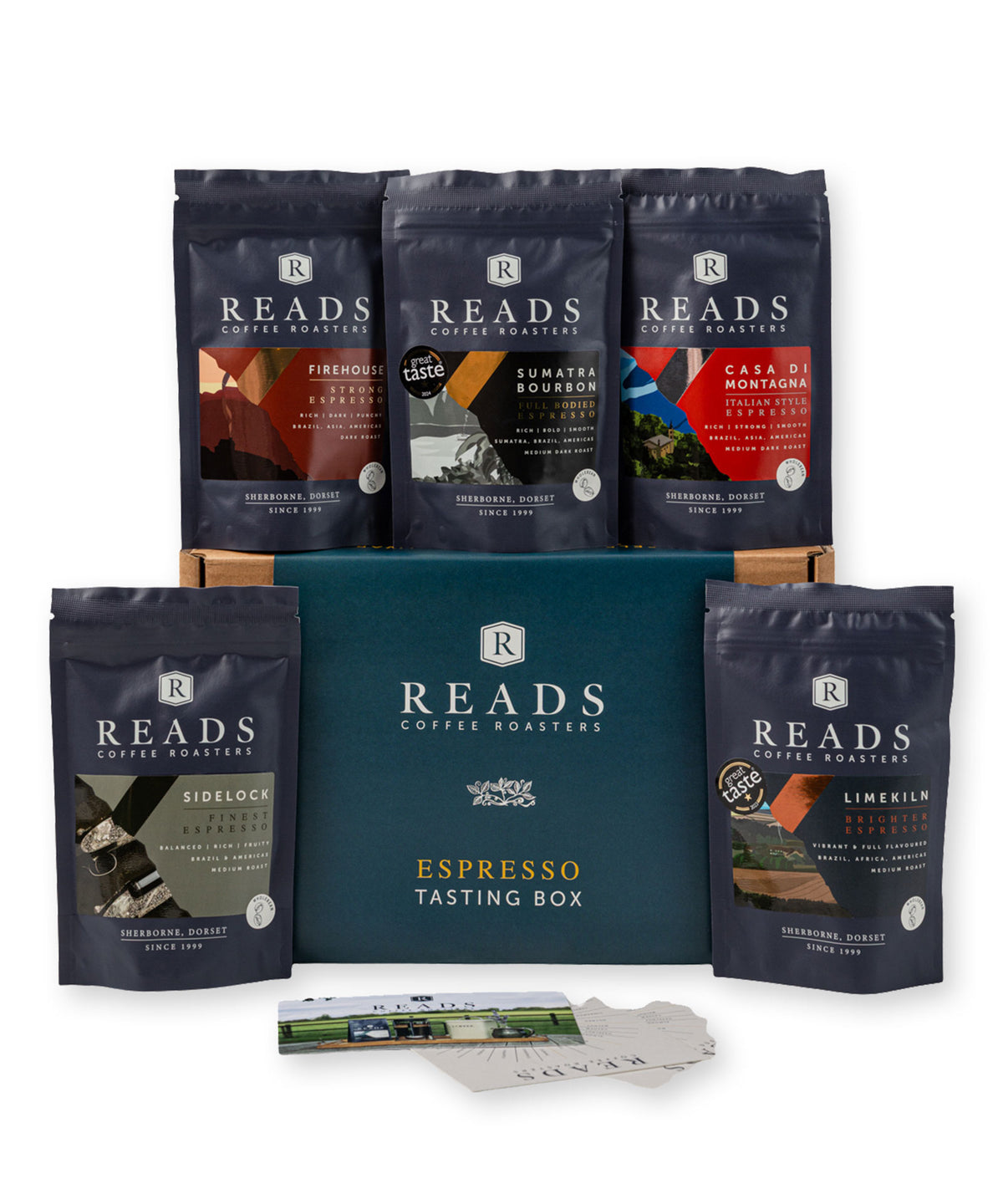 Reads Coffee Roastery Espresso Box gift set featuring five dark navy coffee bean bags arranged around a teal gift box, with a small card and tag in front, on a white background.