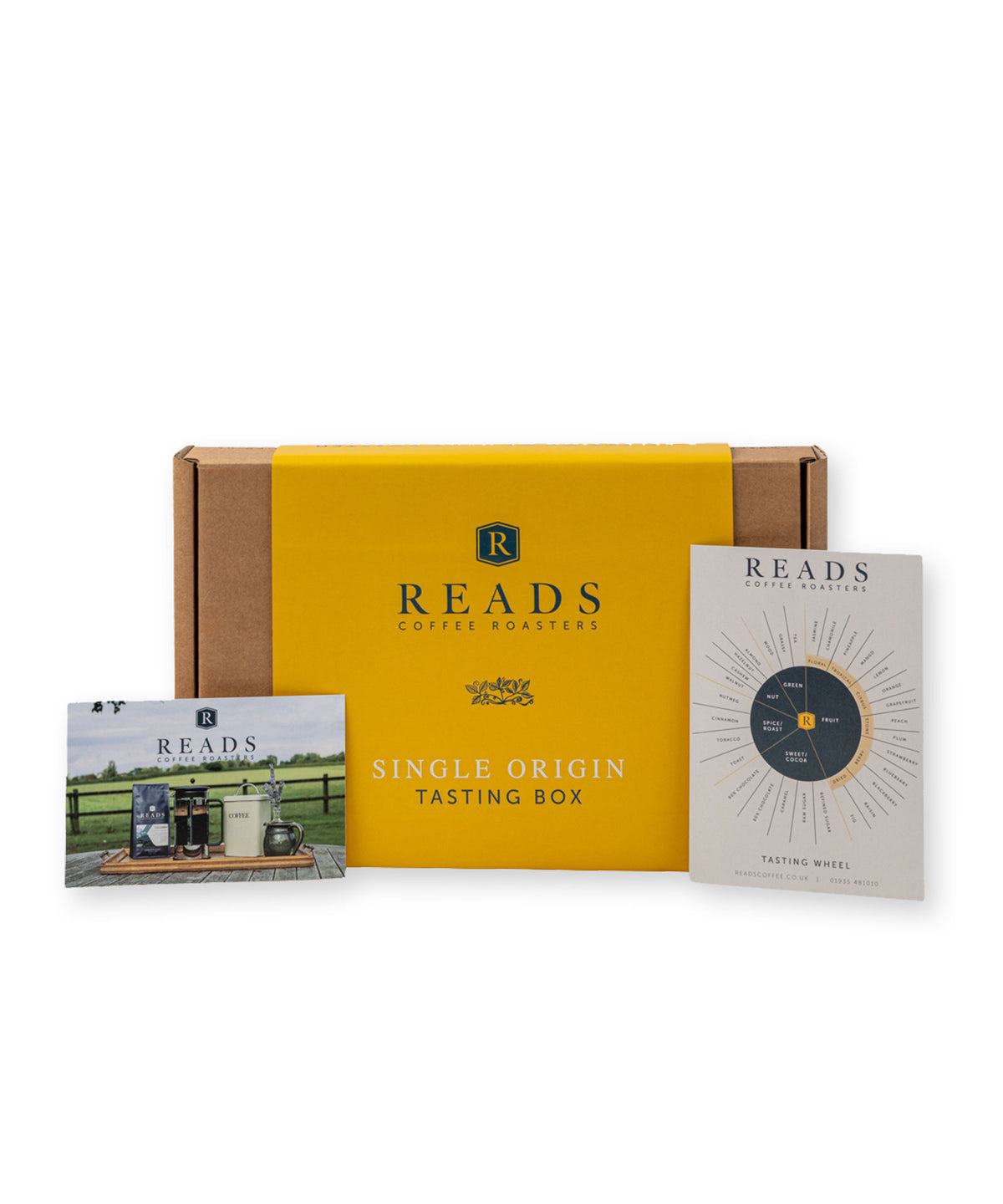 Reads Coffee Roastery Single Origin Tasting Box set, featuring a yellow and brown cardboard box with a yellow label, accompanied by a tasting box photo card and a tasting wheel card on a white background.