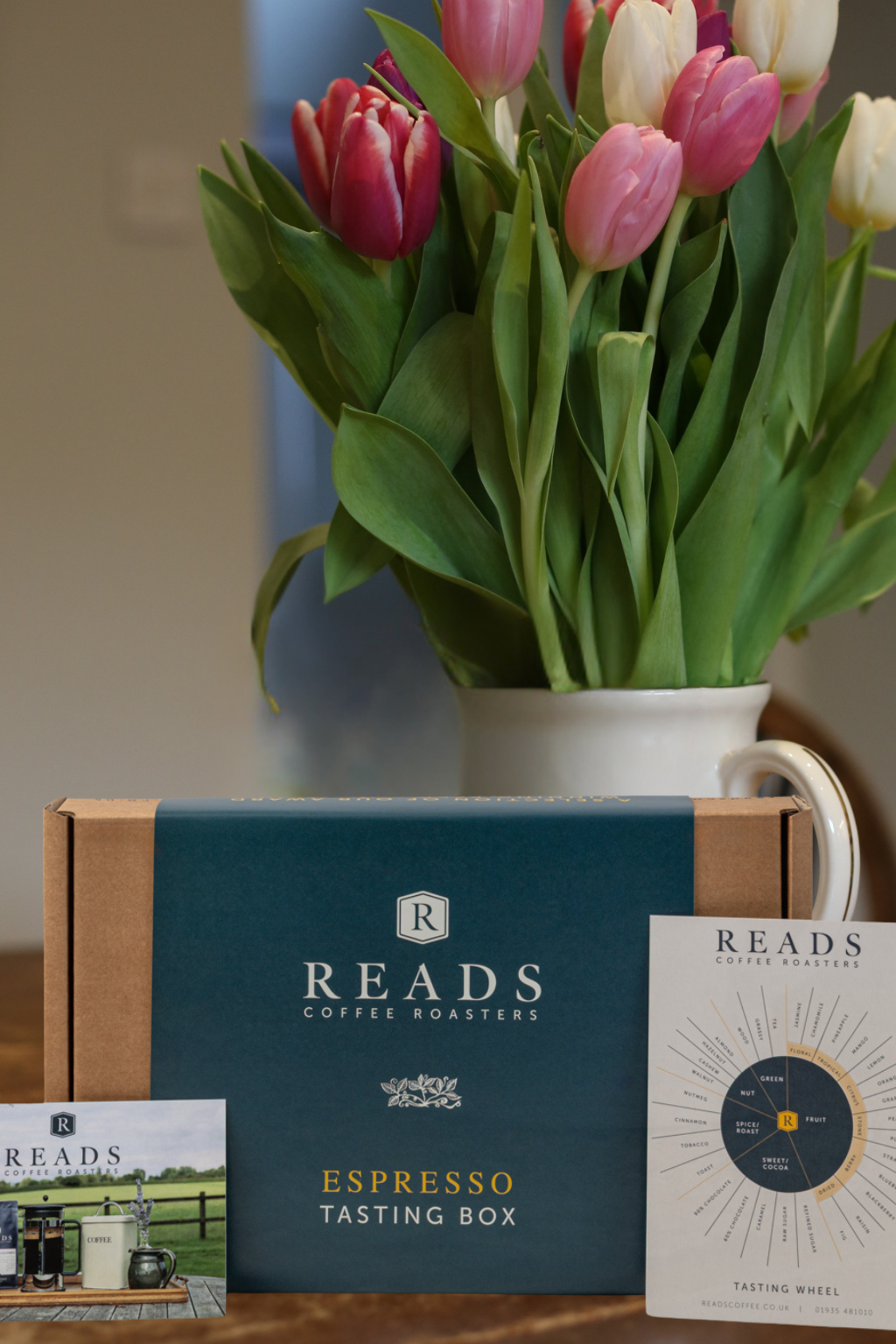 Reads Coffee Roasters espresso tasting box with tulips in the background