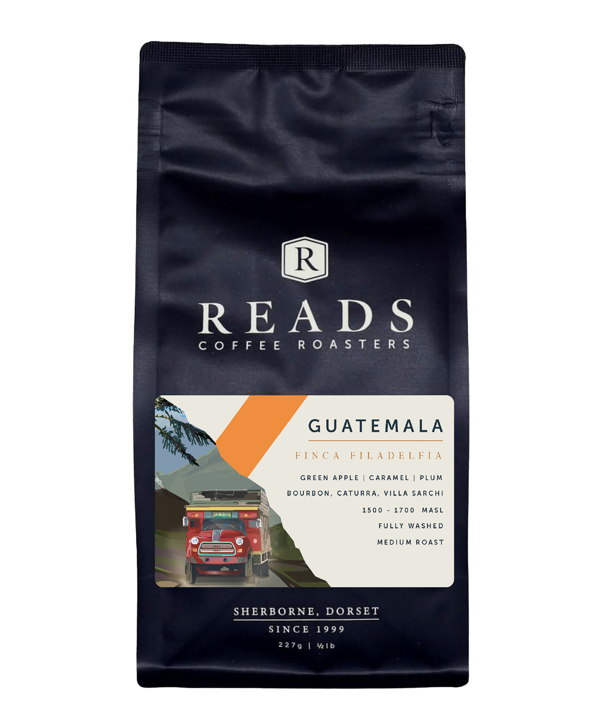 A bag of Reads Coffee Roasters Guatemala Finca Piladelfia medium roast coffee, in a dark navy blue bag with a white and orange label.