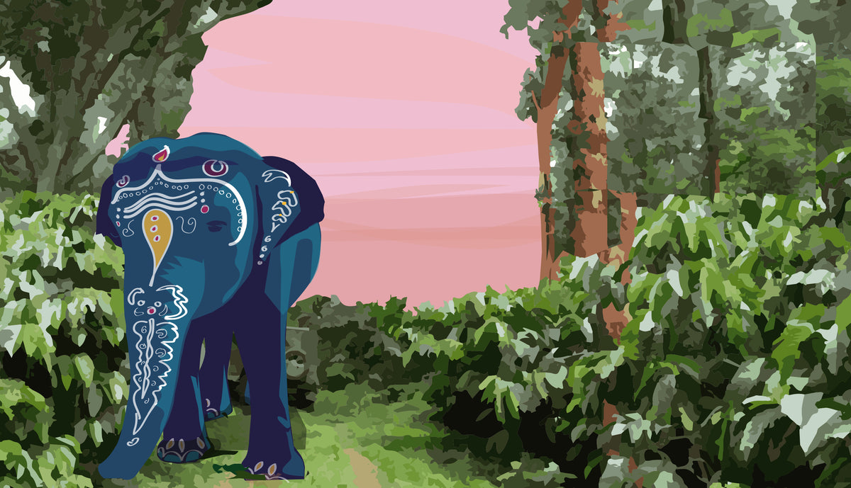 Blue elephant with floral patterns in a forest setting