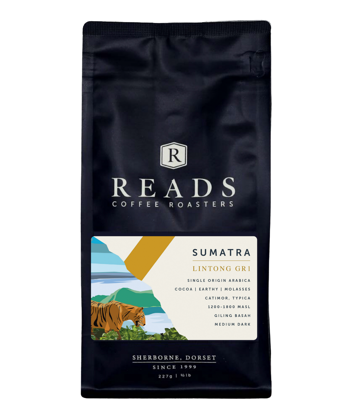 A bag of Reads Coffee Roasters Sumatra Lintong Gri single origin coffee, featuring a dark navy blue bag with a colorful label showing a tiger and landscape illustration.